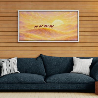 Golden Caravan at Sunset – Dreamy Camel Desert Wall Art Print 03 Dreamy camel desert sunset canvas print displayed on wooden wall above dark blue sofa