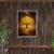 Golden tree fantasy wall art framed on wooden panel wall above bench