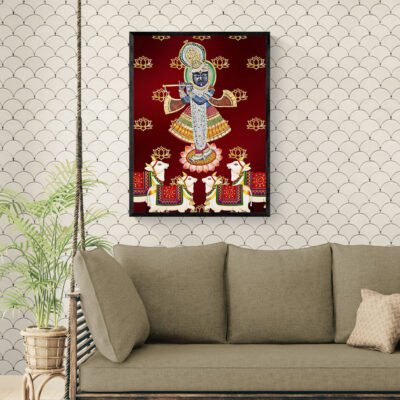 Shreenathji Pichwai painting framed above sofa in modern living room decor.