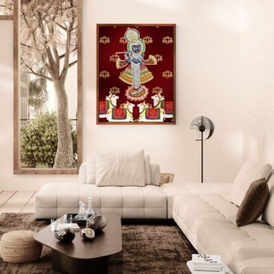 Traditional Shreenathji Pichwai art print displayed in contemporary living room interior.