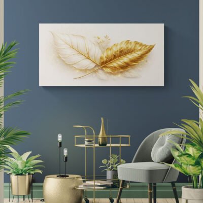 White and gold leaf canvas wall art displayed on dark blue wall with modern gold decor accents