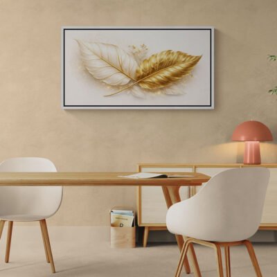 Minimal white and gold leaf wall art framed above wooden desk in modern workspace