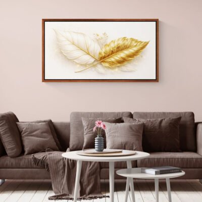 White and gold botanical canvas print displayed above modern neutral sofa