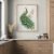 Minimal golden peacock wall art framed in wooden frame in modern kitchen